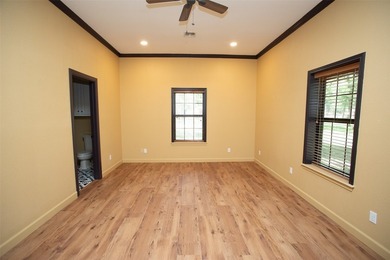 Located on approximately 1.4 wooded acres near Lake Graham, this - photo 14