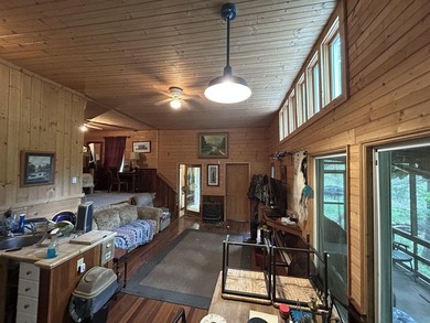 Escape to the serenity of the mountains with this charming cabin - photo 11