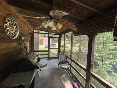 Escape to the serenity of the mountains with this charming cabin - photo 20