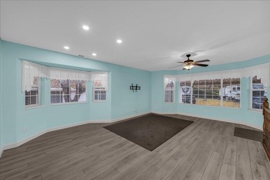 Charming home in a 55+ community offering 2,000+ SF of