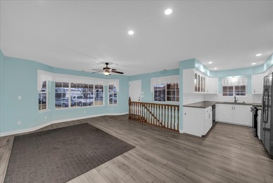 Charming home in a 55+ community offering 2,000+ SF of