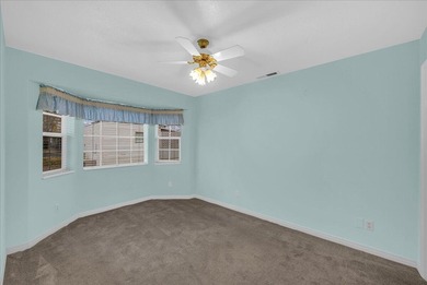 Charming home in a 55+ community offering 2,000+ SF of