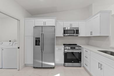 Discover this distinctive 2-bedroom, 2-bath villa that feels - photo 14