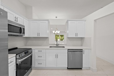 Discover this distinctive 2-bedroom, 2-bath villa that feels - photo 15