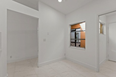 Discover this distinctive 2-bedroom, 2-bath villa that feels - photo 17