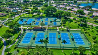 Discover this distinctive 2-bedroom, 2-bath villa that feels - photo 36