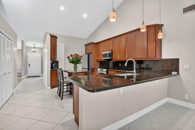 Welcome to this charming three-bedroom, two-bathroom - photo 16