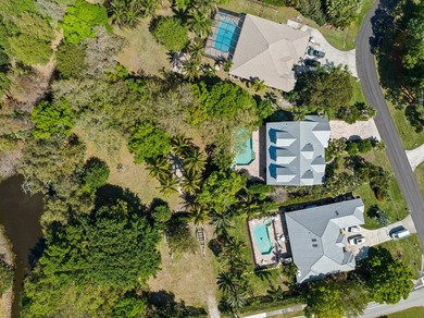 The crown jewel of Sandpiper Bay on .68 acres backing Howard's - photo 5