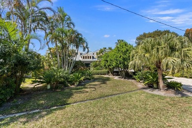 The crown jewel of Sandpiper Bay on .68 acres backing Howard's - photo 8