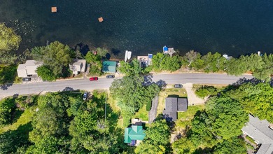 Year-Round Waterfront Cottage on Worthley Pond Tucked along the - photo 6