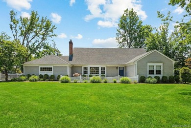Located in the Village of Flower Hill, 38 Hewlett Lane is a - photo 1