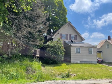 POTENTIAL! This property needs some TLC but has recently had - photo 1