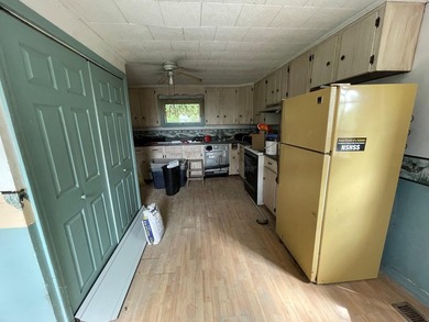 POTENTIAL! This property needs some TLC but has recently had - photo 4