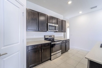 Beautiful updated 4 bedroom home in a gated community. New - photo 10