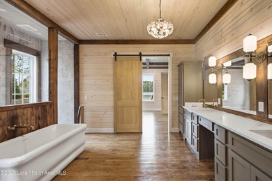 This new construction lake home offers five bedrooms and - photo 20