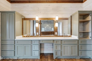 This new construction lake home offers five bedrooms and - photo 21
