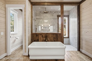 This new construction lake home offers five bedrooms and - photo 22