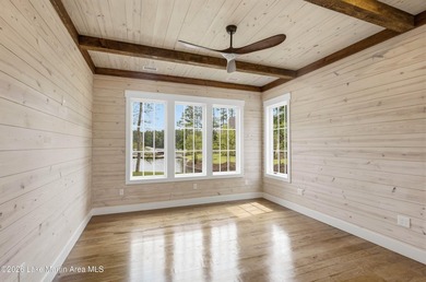 This new construction lake home offers five bedrooms and - photo 30