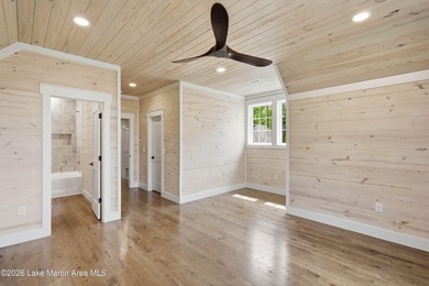This new construction lake home offers five bedrooms and - photo 39