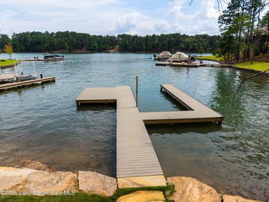 This new construction lake home offers five bedrooms and - photo 49