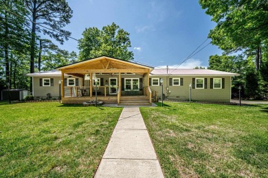 This 3 BR/3 BA home is on a spectacular oversized Mid Cove *Wide - Lake Home For Sale in Eatonton, Georgia