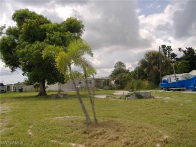 Large, cleared lot located in Flamingo Bay community ready for - photo 5