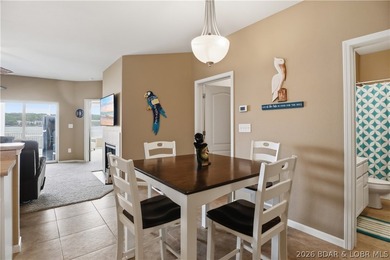 Experience elevated lake living in this rare lakefront condo - photo 12