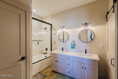 Overlooking Grand Elk Golf Course, this stunning fully furnished - photo 14