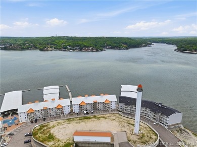 Experience elevated lake living in this rare lakefront condo - photo 37