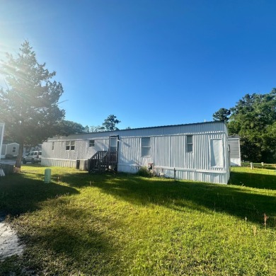 Lake Home For Sale in Gainesville, Florida