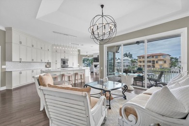 THIS CUSTOM-BUILT WATERFRONT RESIDENCE is elevated & offers an - photo 13