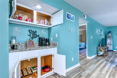 Relax in the large 3rd floor end unit with an Oceanview. The - photo 14