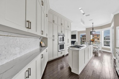 THIS CUSTOM-BUILT WATERFRONT RESIDENCE is elevated & offers an - photo 14