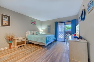 Relax in the large 3rd floor end unit with an Oceanview. The - photo 15
