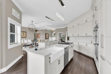 THIS CUSTOM-BUILT WATERFRONT RESIDENCE is elevated & offers an - photo 15