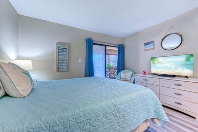 Relax in the large 3rd floor end unit with an Oceanview. The - photo 18
