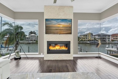 THIS CUSTOM-BUILT WATERFRONT RESIDENCE is elevated & offers an - photo 22