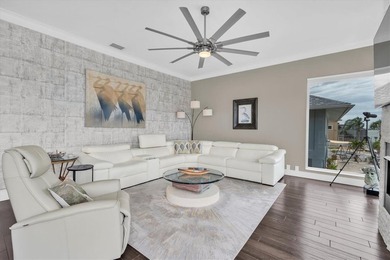 THIS CUSTOM-BUILT WATERFRONT RESIDENCE is elevated & offers an - photo 24