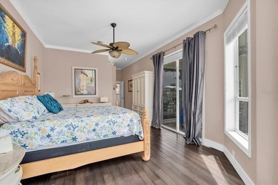 THIS CUSTOM-BUILT WATERFRONT RESIDENCE is elevated & offers an - photo 28