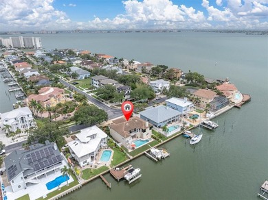 THIS CUSTOM-BUILT WATERFRONT RESIDENCE is elevated & offers an - photo 49