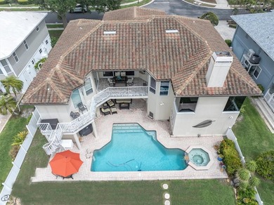 THIS CUSTOM-BUILT WATERFRONT RESIDENCE is elevated & offers an - photo 50