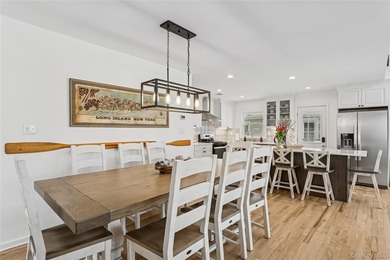 Welcome to 246 W Bay Drive, a stunning waterfront retreat in the - photo 11
