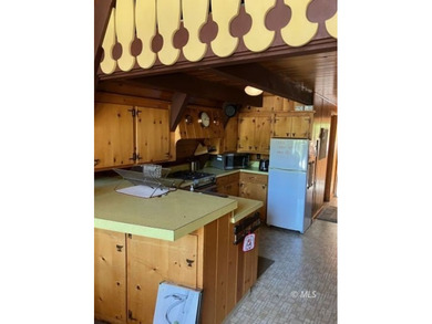 The main A-frame house and two smaller A-frame cabins over - photo 12