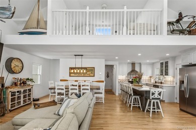 Welcome to 246 W Bay Drive, a stunning waterfront retreat in the - photo 12