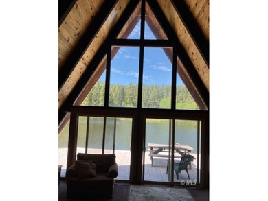The main A-frame house and two smaller A-frame cabins over - photo 13