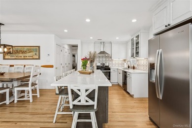 Welcome to 246 W Bay Drive, a stunning waterfront retreat in the - photo 13