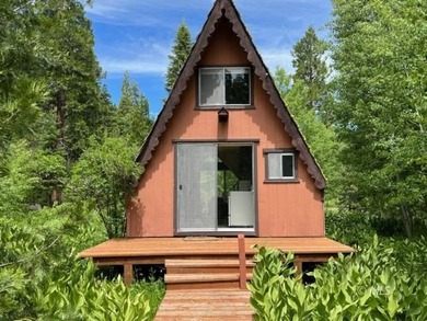The main A-frame house and two smaller A-frame cabins over - photo 14