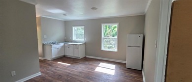 This cozy 1-bed, 1-bath updated camp house offers a serene - photo 6