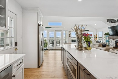 Welcome to 246 W Bay Drive, a stunning waterfront retreat in the - photo 17