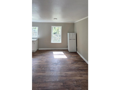 This cozy 1-bed, 1-bath updated camp house offers a serene - photo 7